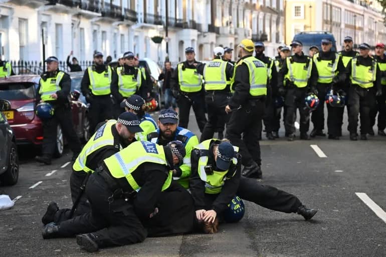 man detained in london