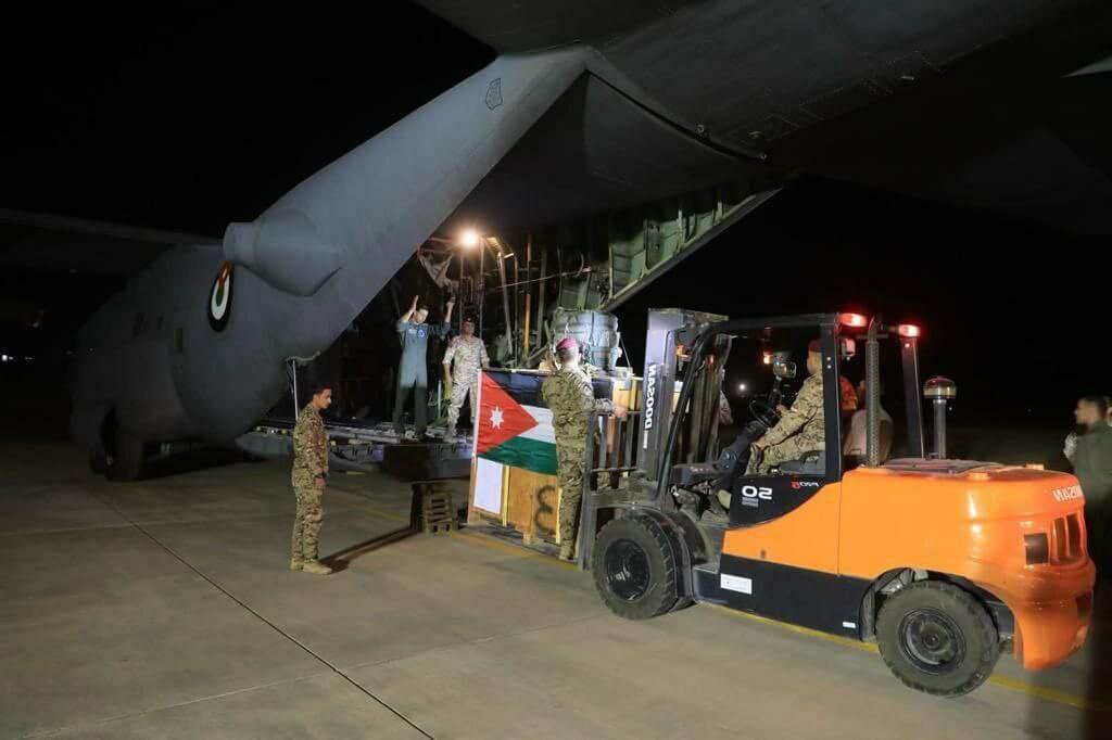 supplies being loaded to plane