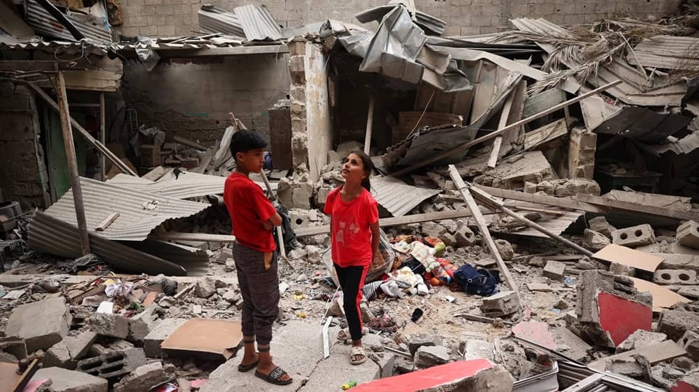 children on rubble